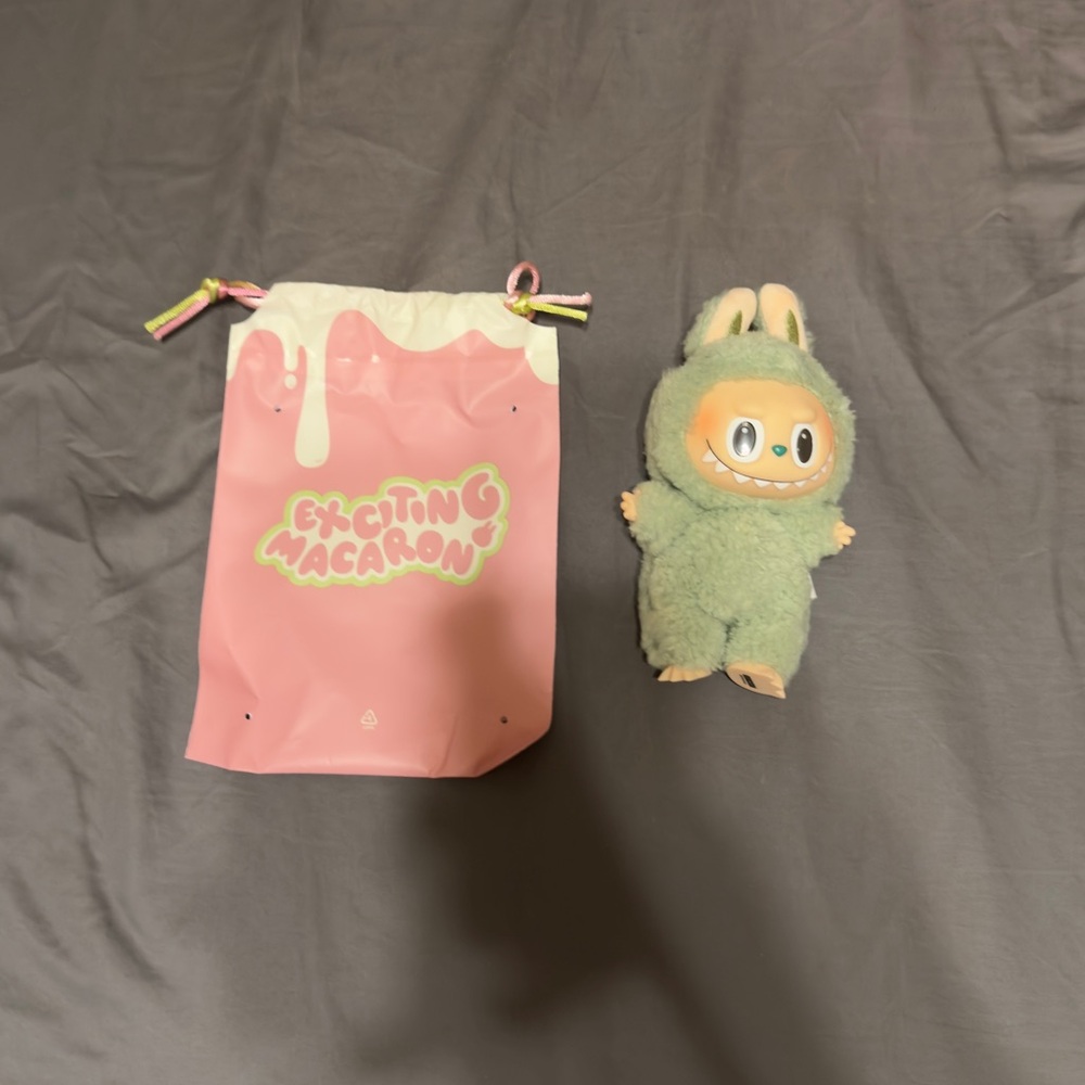 POP MART The Monsters Exciting Macaron Vinyl
Plush GREEN GRAPE Labubu